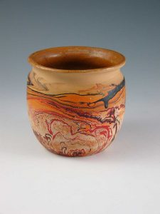 Orange, red, and brown pot.
