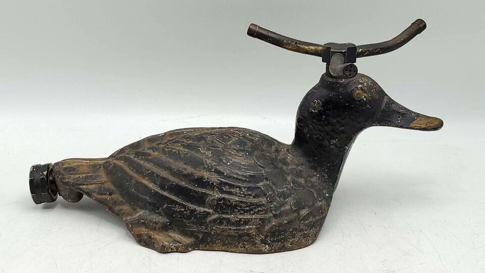1900s duck sprinkler.