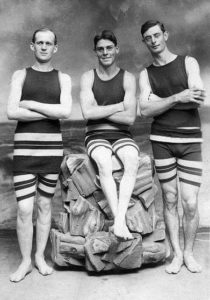1910- 3 men in tank suits