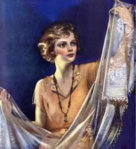 1920s illustration of a woman looking at table linens.