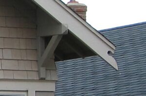 Bargeboard corner on gray house.