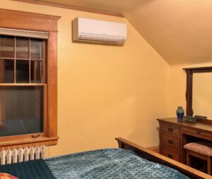 Minisplit on bedroom wall.