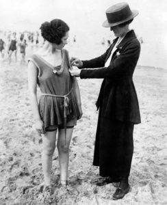 woman measuring another woman's arm