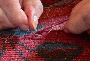 Closeup of a curved needle.