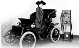 Woman with electric vehicle.