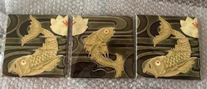 Three fish tiles.