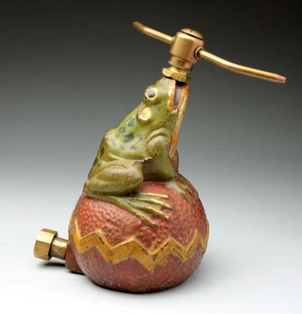 Frog on ball sprinkler.