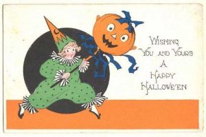 postcard with clown holding a pumpkin