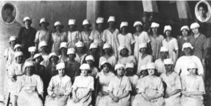 A group of women laborers pose for a photo