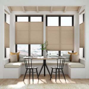 Modern pleated shades in windows.