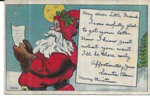 Postcard of Santa reading a letter
