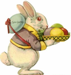 Vintage Easter card with rabbit carrying a bowl of eggs.