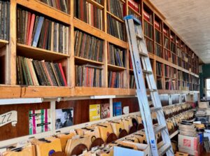 Ladder and record stacks.