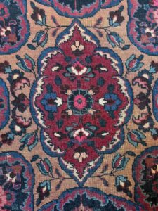 Closeup of rug’s center medallion.