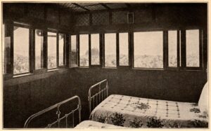 Beds in a sleeping porch.
